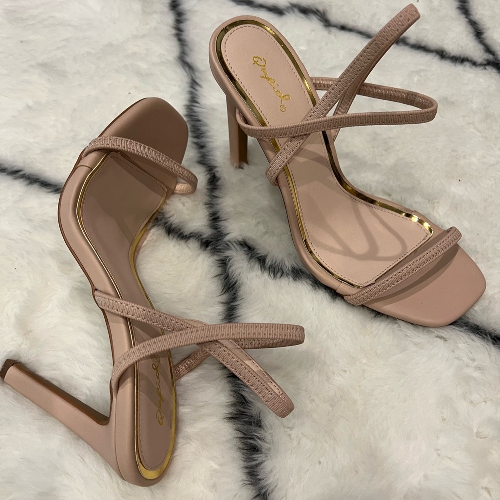 Nude simple strap high heel. New without box.